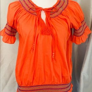 Apollo embroidery orange blouse made in India